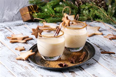 Eggnog christmas cocktail containing eggnog, cinnamon, and christmas ...