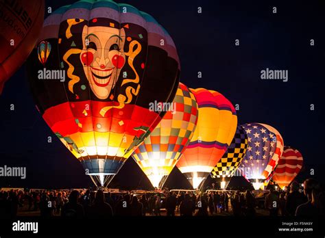 Illuminated colorful hot air balloons during Balloon Glow, Albuquerque ...