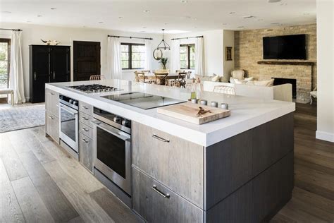 The gas and induction cooktop, along with the two ovens below, face the ...