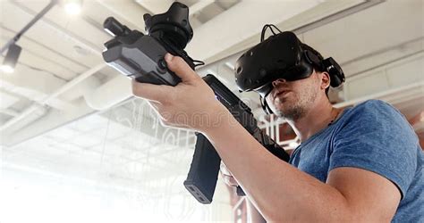 Man Play VR Shooter Game With Virtual Reality Gun And Vr Glasses Stock ...