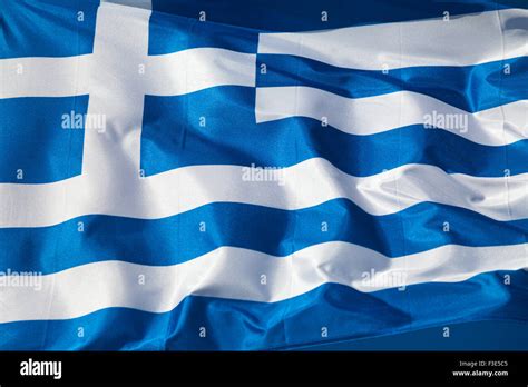 Waving Greek flag Stock Photo - Alamy