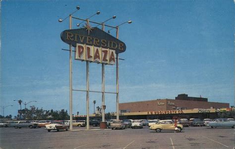 Riverside Plaza shopping center sign and parking lot California Postcard