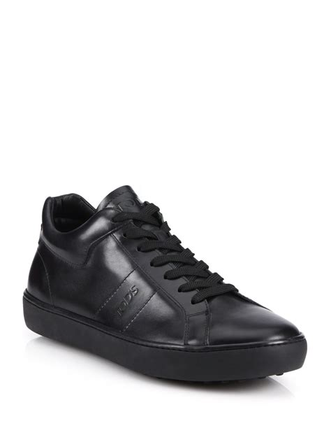 Tod's Solid Leather Sneakers in Black for Men | Lyst