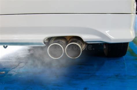 Car exhaust smoke stock photo. Image of closeup, chrome - 138557508