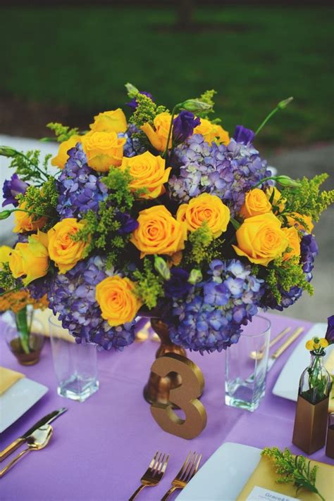 Elegant Lavender and Yellow Centerpiece // image by http ...