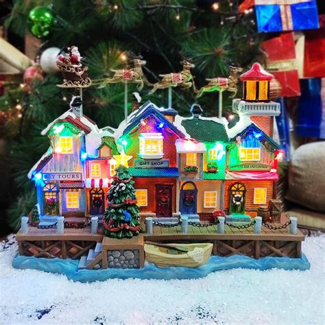 Carole Towne Ct Skip Pier Lighted Musical Village Scene at Lowes.com