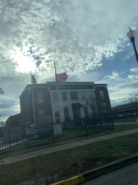 Marshall County Alabama Courthouse flying a tattered Ol glory, but a ...