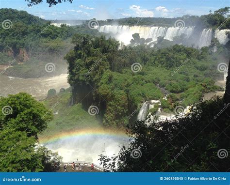 Rainbow in Iguazu falls stock image. Image of verano - 260895545