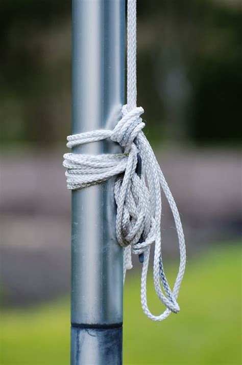 Rope With Knots Tied To A Flagpole Stock Image - Image: 13739319