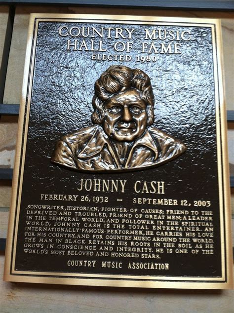 the plaque for johnny cash is on display at the country music hall of fame