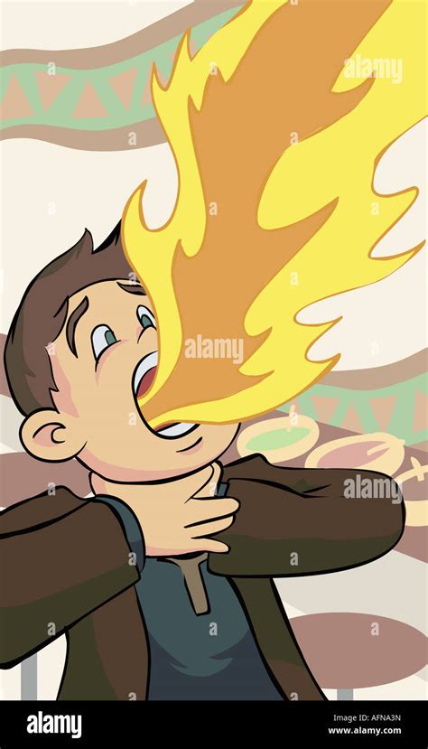 Young man fire breathing Stock Photo - Alamy