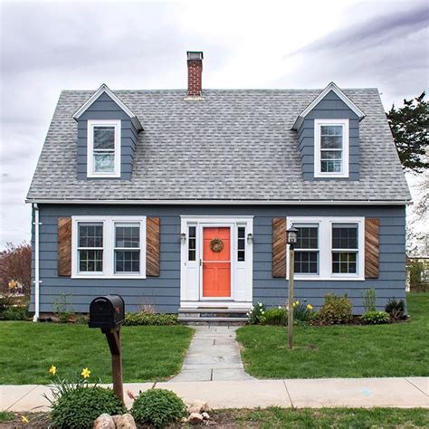 How adorable is this Cape Cod style home? The shutters are a unique ...