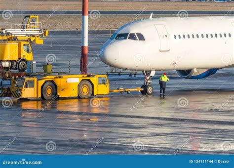 TUG Pushback Tractor With Aircraft. Royalty-Free Stock Photo ...