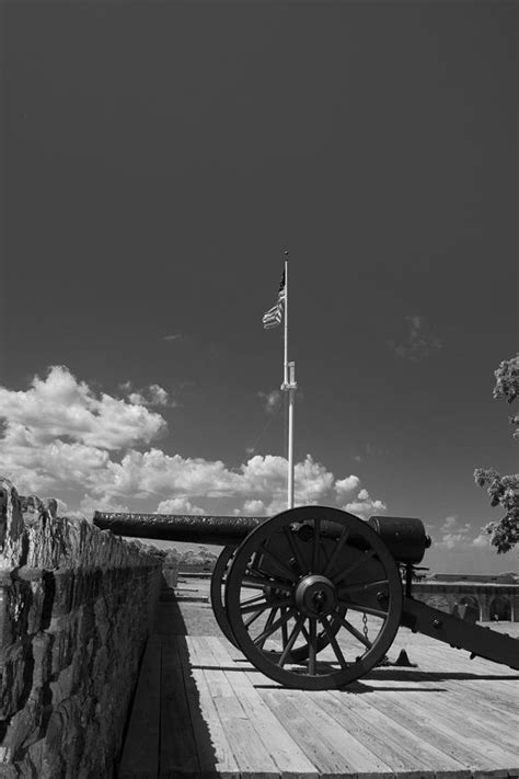 Fort Pulaski Cannon And Flag in Black and White Photograph by Greg and ...