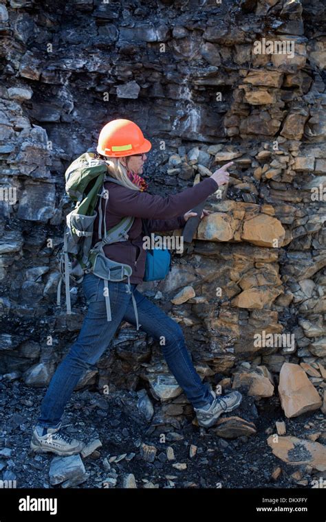 Female Geologist examining Marcellus shale, near Marcellus New York ...