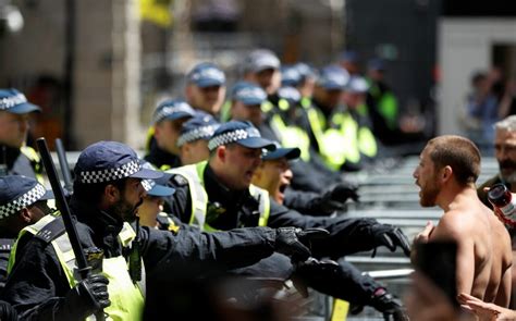 London protests live: Two police officers injured in clashes with far ...