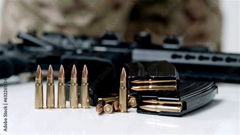 Hand taking ammo, bullets 762 caliber for ak47, gun crime military ...