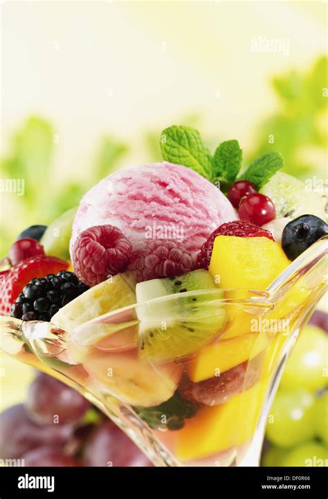 Fruit salad with ice cream Stock Photo - Alamy