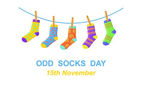 Odd socks day banner. Different colorful odd socks hanging on the rope ...