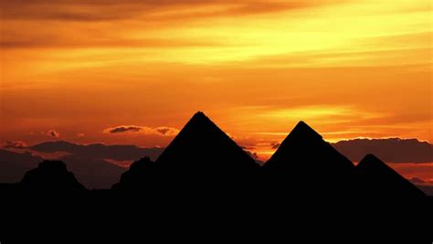 Sunrise Behind Great Pyramids In Giza Valley, Cairo, Egypt Stock ...