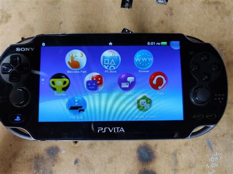 Sony PS Vita - PCH-1000 1GB Gloomy Handheld System - iCommerce on Web