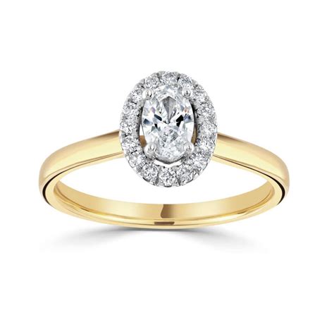 Oval Halo 18ct yellow gold – Martins Jewellers