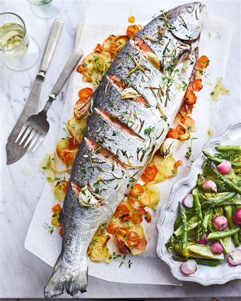 Whole roast salmon with spring vegetables recipe | delicious. magazine