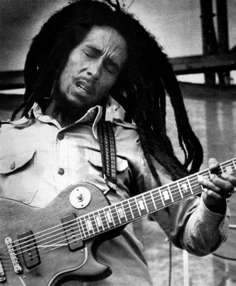 Bob Marley Playing Guitar Photograph by Retro Images Archive - Pixels