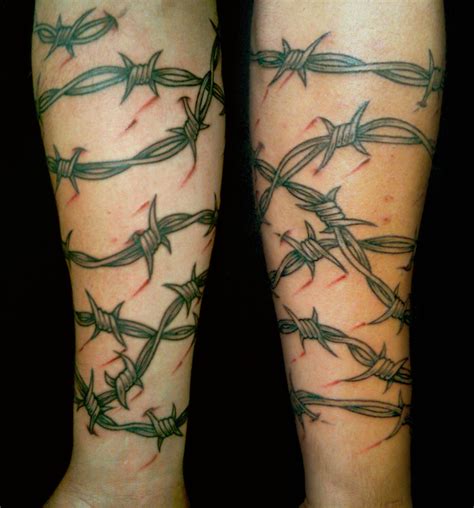 Barb Wire Arm Tattoo | Barbed wire tattoos, Full sleeve tattoos, Tattoos