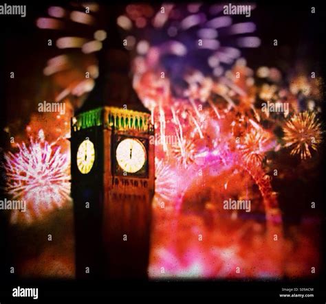 Big Ben and London Eye fireworks on New Year's Eve, City of Westminster ...