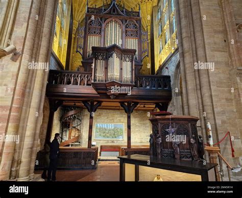 A low angle shot of the organ in the North Transept inside Sherborne ...