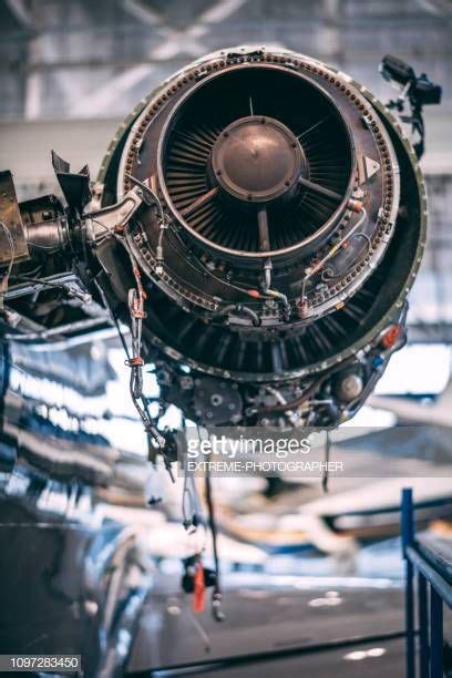 Jet engine of a small airplane completely without panels with some ...