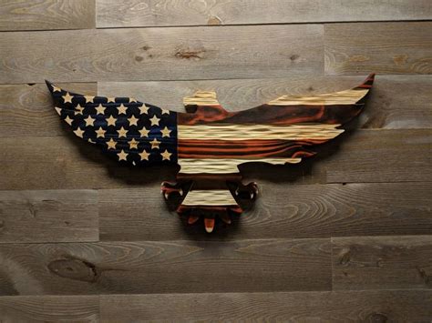 Carved wooden American flag eagle with unique chisel texture.