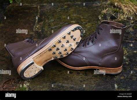 Pair of brown leather work boots with studded sole, hobnail boots and ...