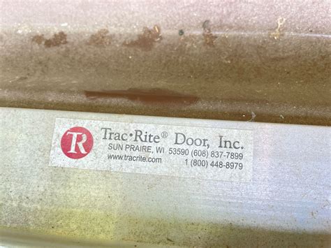 TRAC-RITE ROLLED UP GARAGE DOOR