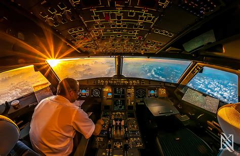 sunrise in airplane cockpit photo | One Big Photo