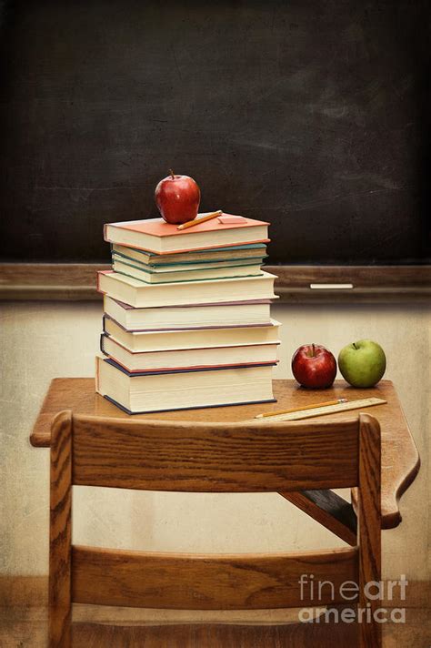 Old desk with a stack of books with vintage look Photograph by Sandra ...