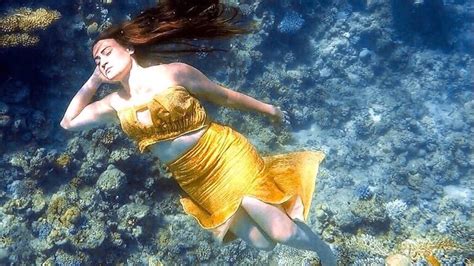 First underwater fashion show in Egypt - Al-Monitor: Independent ...