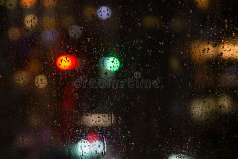 Rainy window at night stock photo. Image of defocused - 55642430