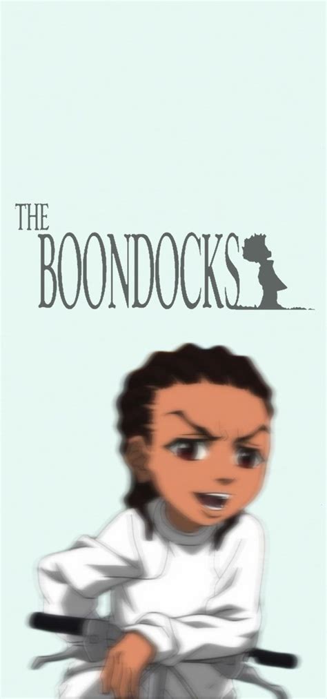 the boondocks movie poster with an image of a boy on a bike and another man