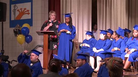 High School Student Graduates, As Her Hero Cheers Her on