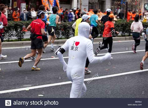 Funny marathon runners in costumes during the 2009 Tokyo Marathon Stock ...