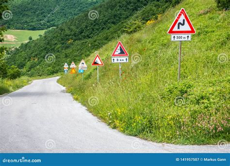 Some Street Signs on a Steep Road Stock Image - Image of transportation ...