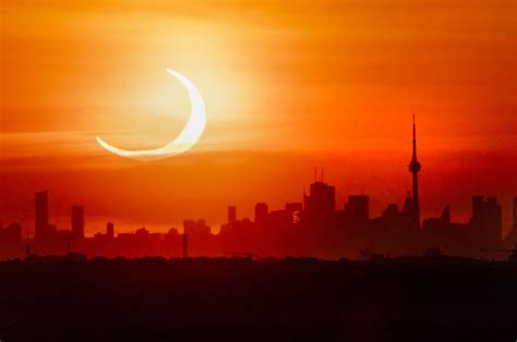 Stunning photos show solar eclipse as a ‘ring of fire’ over Canada ...