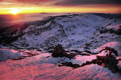 Sunrise Over Snowy Mountains by Maya Karkalicheva