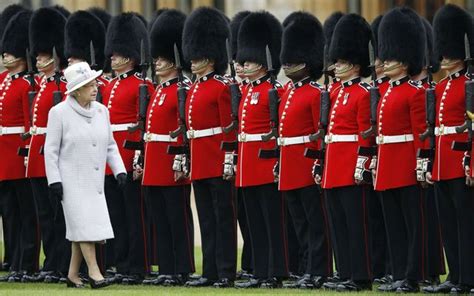 Queen's Guards - Coldstream Guards Take Photo With Young Boy