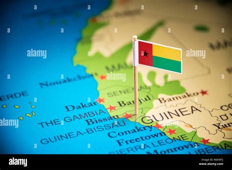 Guinea Bissau marked with a flag on the map Stock Photo - Alamy