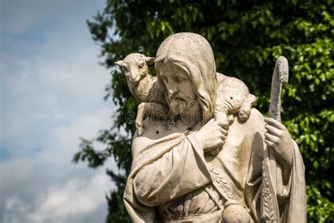 Jesus Christ Statue with a Lamb Stock Photo - Image of holy, statue ...