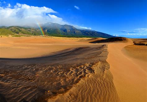 Rainbow At Sand Dunes Np Colorado Photograph by Lana Smith