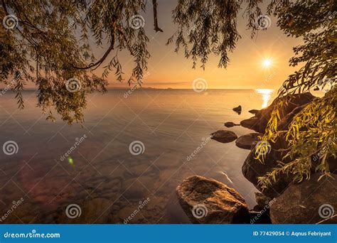 View of Simcoe Lake during Sunrise Stock Photo - Image of water ...